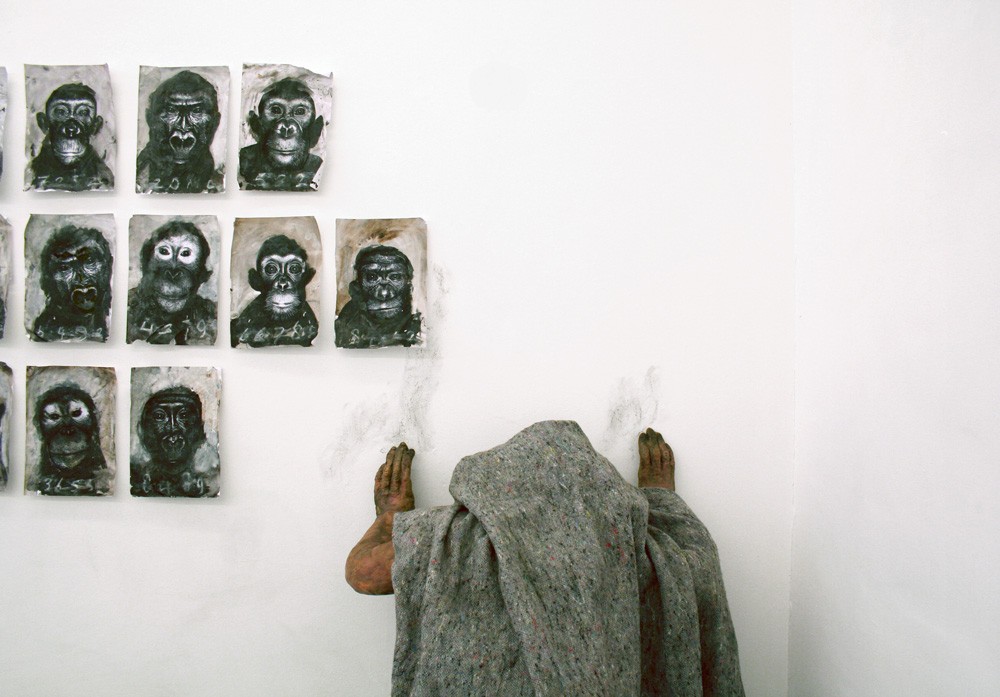 101.-War-zone-II,-close-up-Installation,-sculpture-with-17-monkey-portraits,-mixed-media,-sculpture-ceramic-plaster-mixed-media,-220-cm-x-250-x-x-60-cm,-2013.